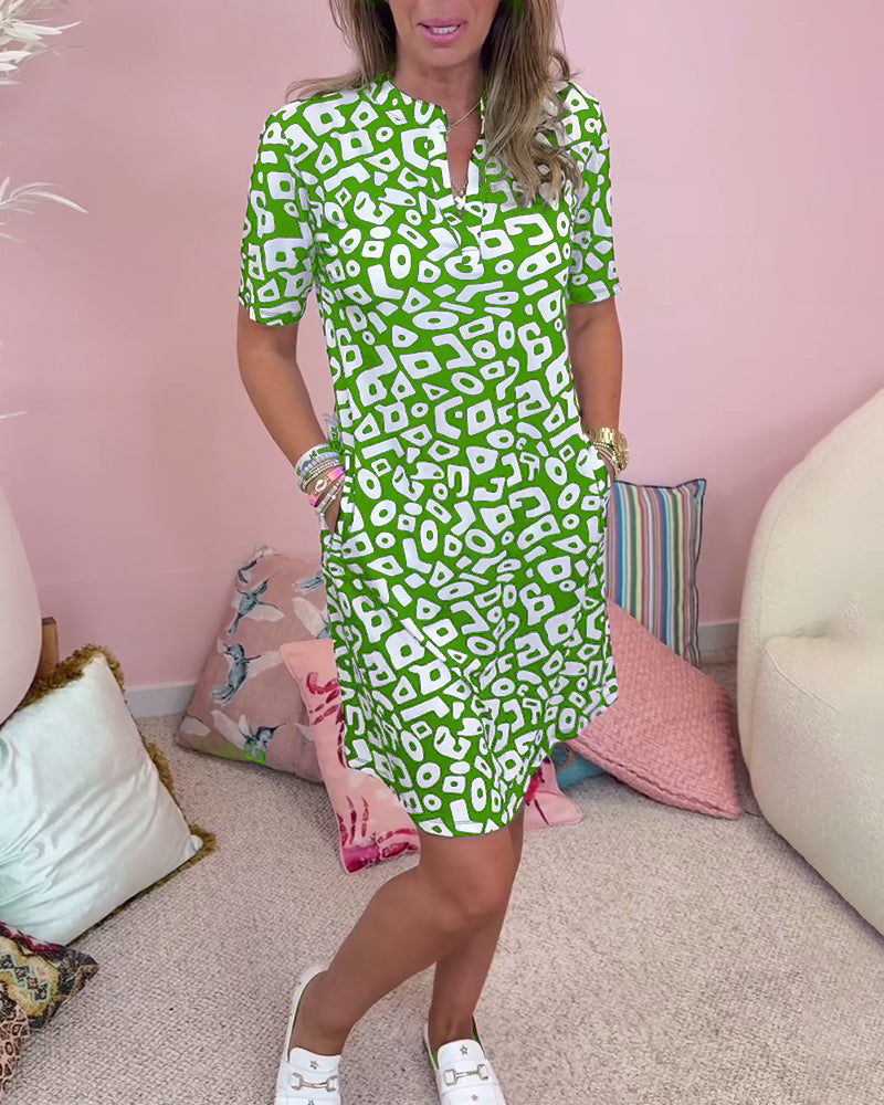 Vivi™ | Jurk met print, v-hals en zakken