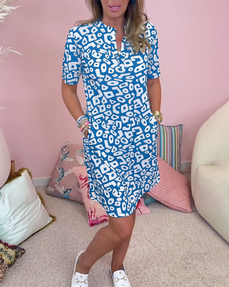 Vivi™ | Jurk met print, v-hals en zakken
